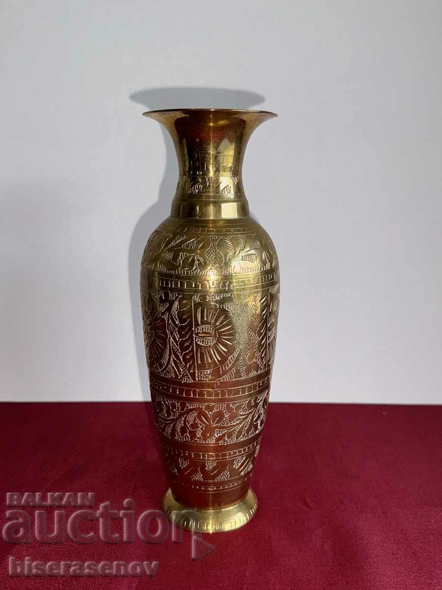 Relief bronze vase
