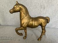 brass statuette of a horse