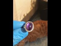 Silver ring with a purple stone