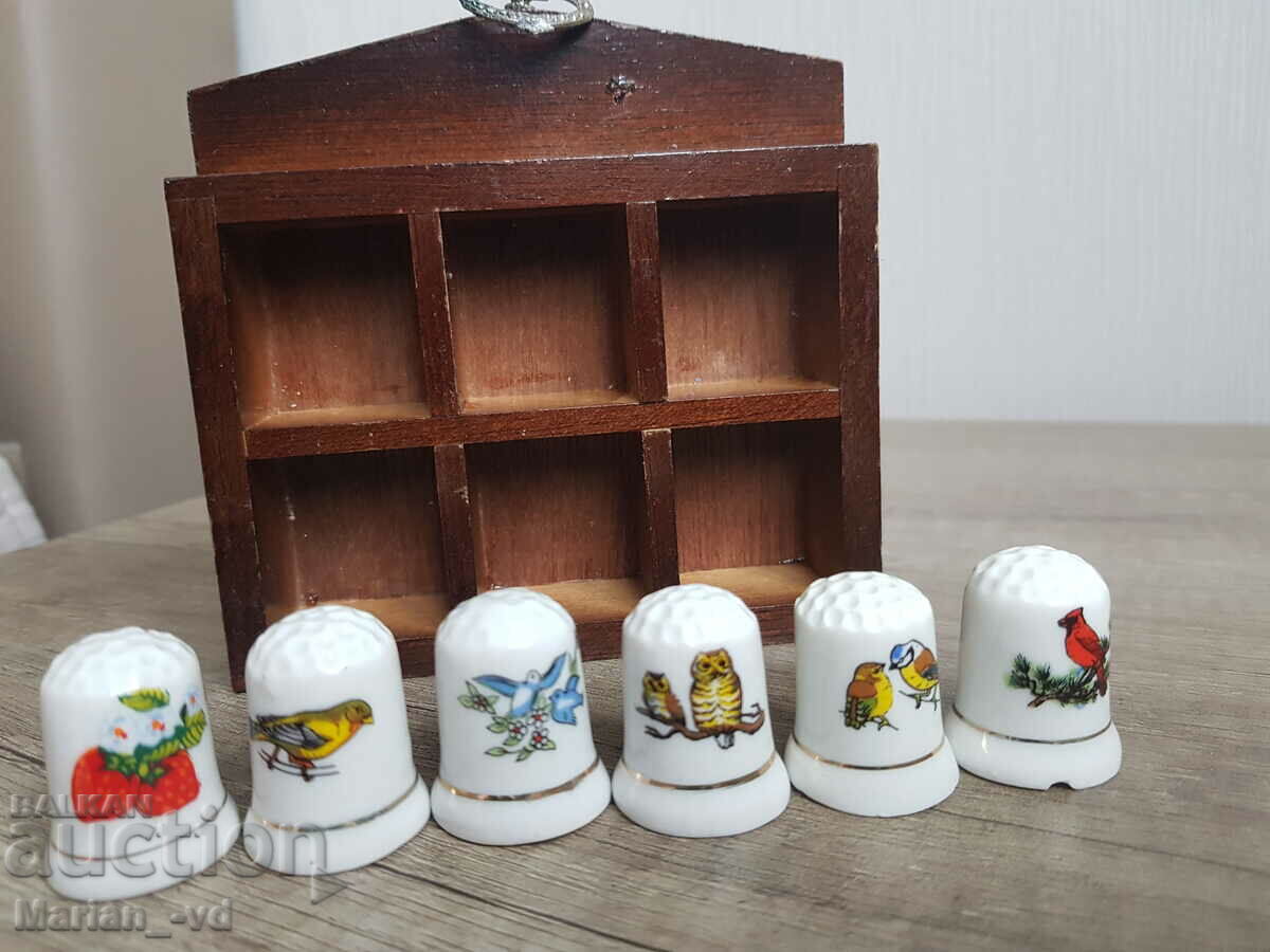 Porcelain thimbles 6 pieces with mini shelf with price 25.00 BGN | € 12.78 Porcelain thimbles 6 pieces with mini shelf with price 25.00 BGN | € 12.78