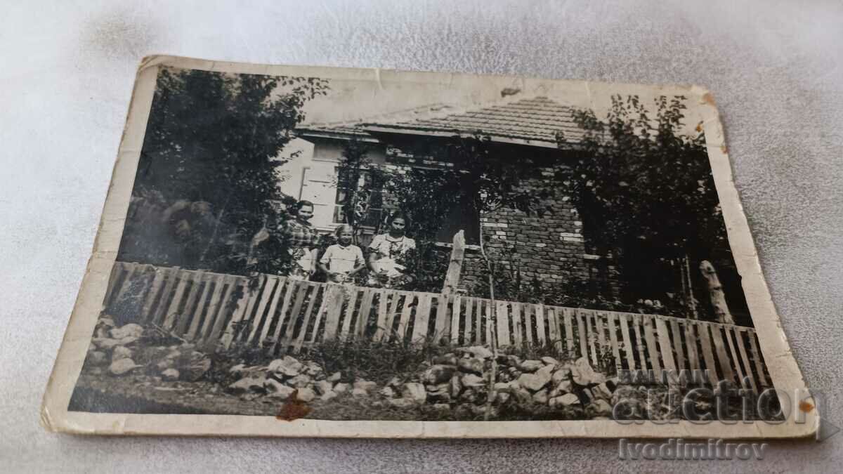 Photo Three girls in the yard of a house at 8 Nevsky St