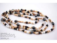 Long necklace with various beads