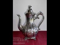 A beautiful silver-plated jug with markings