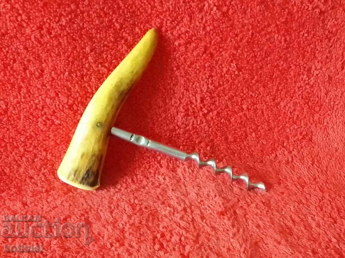 Old metal Corkscrew with horn handle