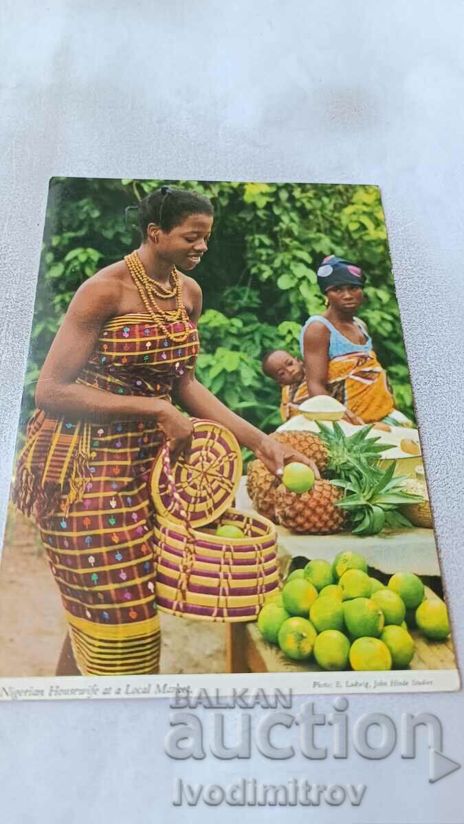 Nigerian Housewife at a Local Market 1982 postcard