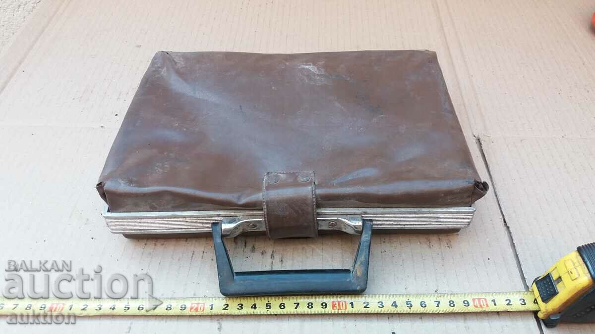 Delivery of old retro first aid kit from a car Delivery of old retro first aid kit from a car