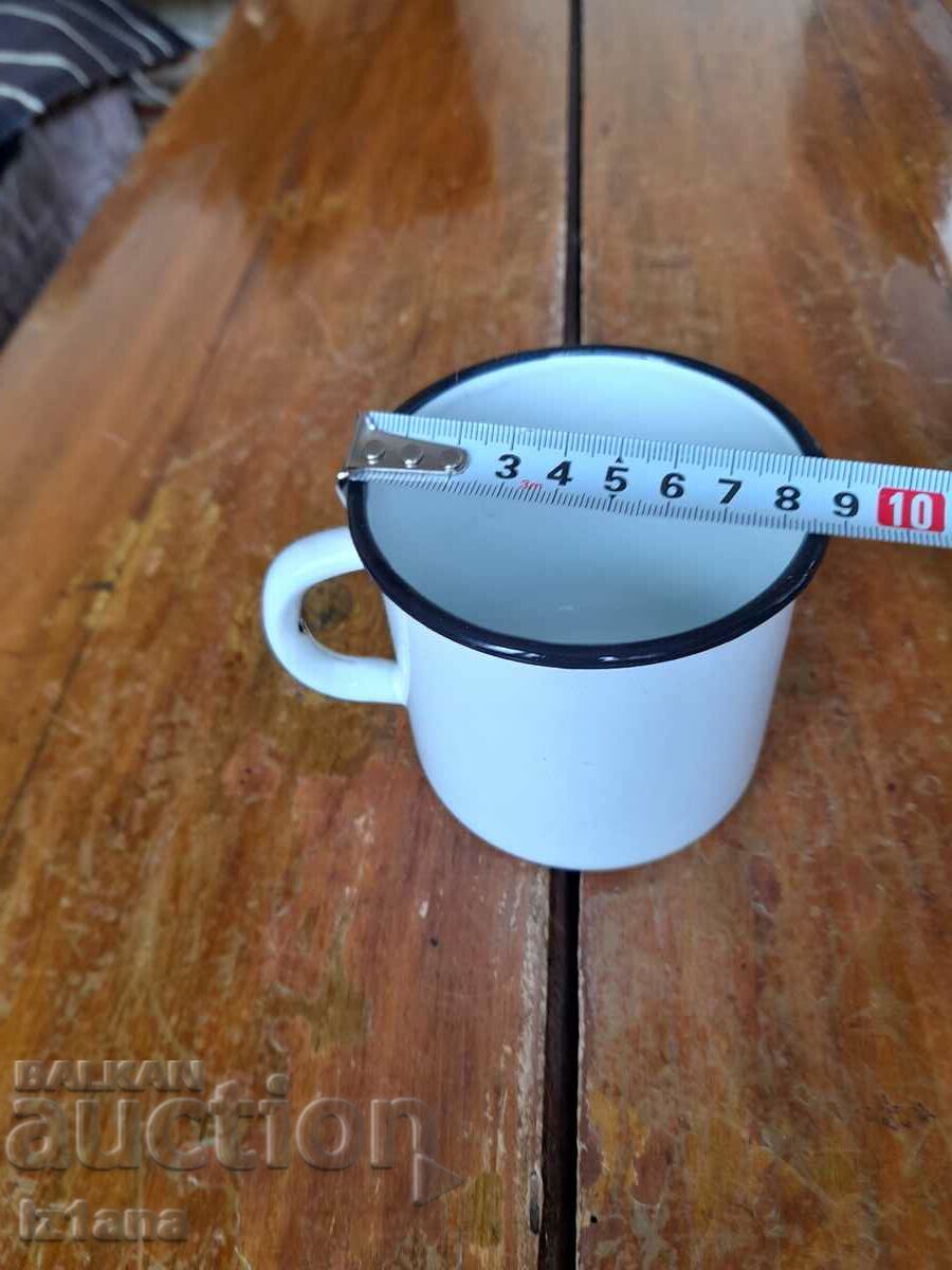 Delivery of Old enameled jug, cup Delivery of Old enameled jug, cup