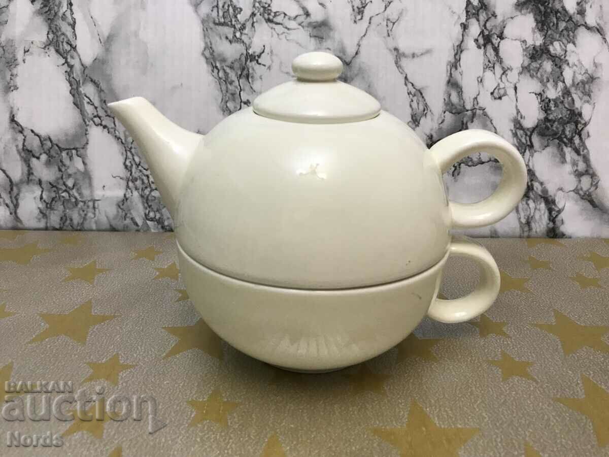Porcelain teapot with bowl