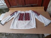 Shirt with lots of embroidery and ruffles. Costumes