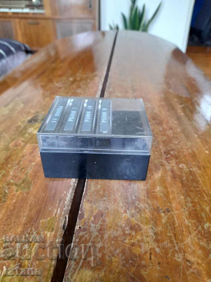 Old cassette deck, box for cassettes