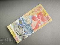 Τραπεζογραμμάτιο - Ανατολική Καραϊβική - 2 δολάρια (Ιωβηλαίο) UNC | 2023