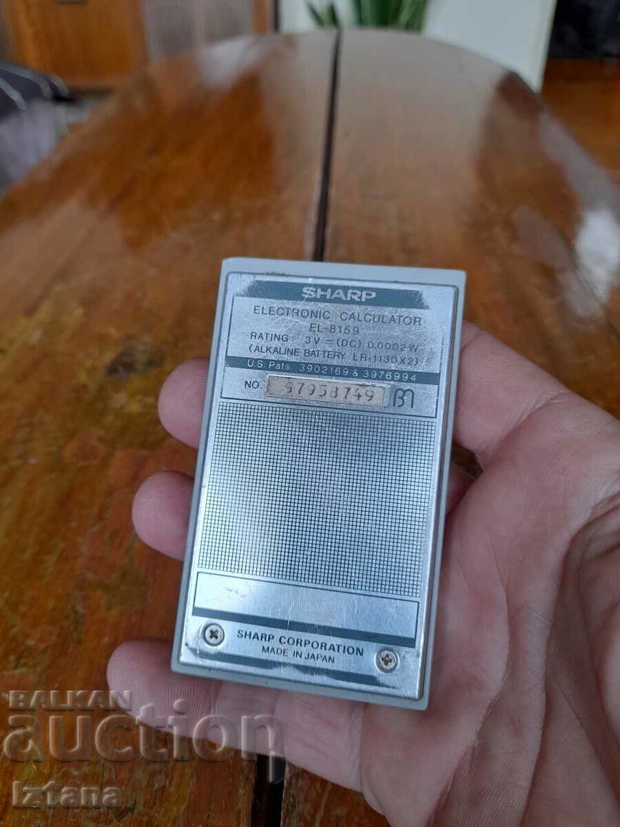 Delivery of Old Sharp Elsi Mate EL 8159 calculator