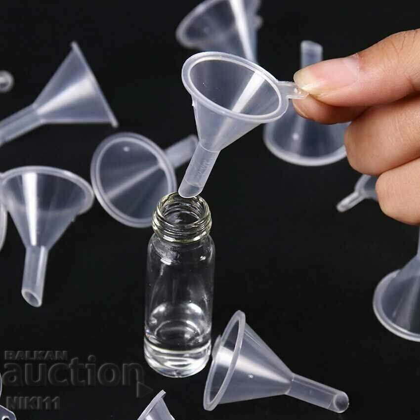 Auction A small funnel for filling essential oils and perfumes Auction A small funnel for filling essential oils and perfumes