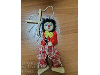 Old children's clown doll on strings