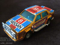 Jucărie veche Nissan Rally Paris Dakar