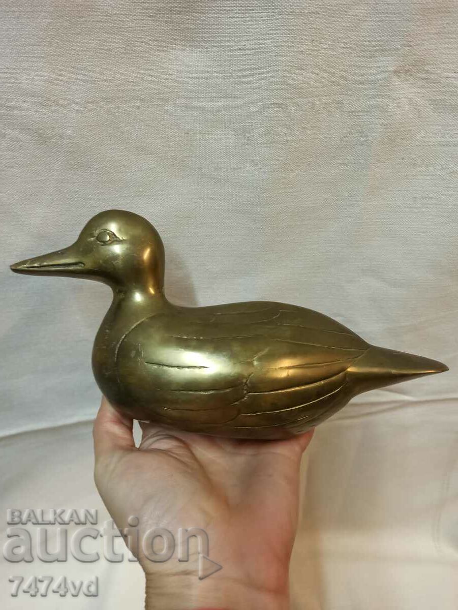 A QUITE SOLID BRONZE PLASTIC OF A DUCK