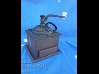 Old manual cast iron coffee grinder