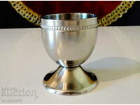 Brandy glass, cocktail shaker.