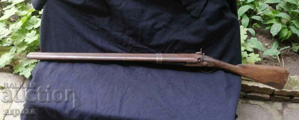 Double-barreled capsule rifle. Like Philip Totyu!