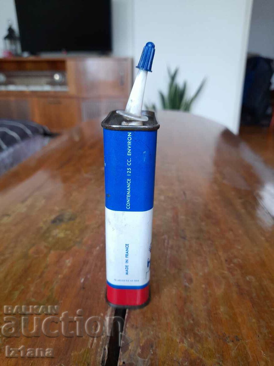 Delivery of An old Esso oil can