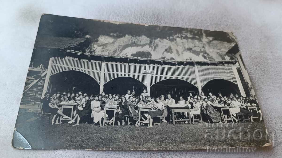 Photo Young men and women in the Dining Room