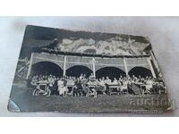 Photo Young men and women in the Dining Room