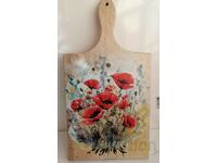 Beautiful souvenir cutting board with poppies/flowers.
