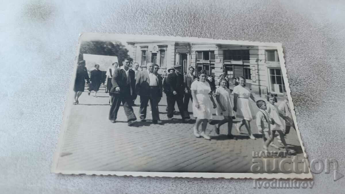 Photo Sofia Men, women and children in a procession along the street 1946