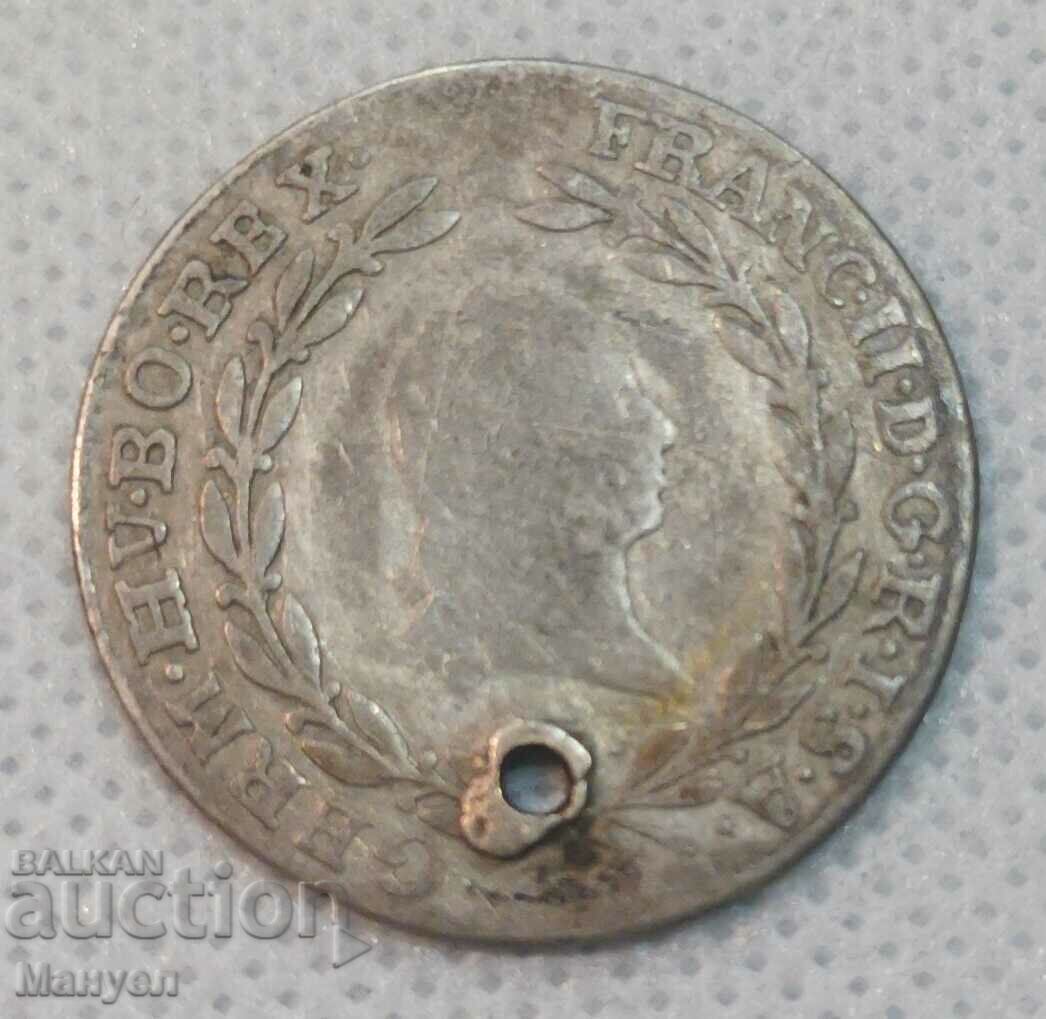 Стара сребърна монета.