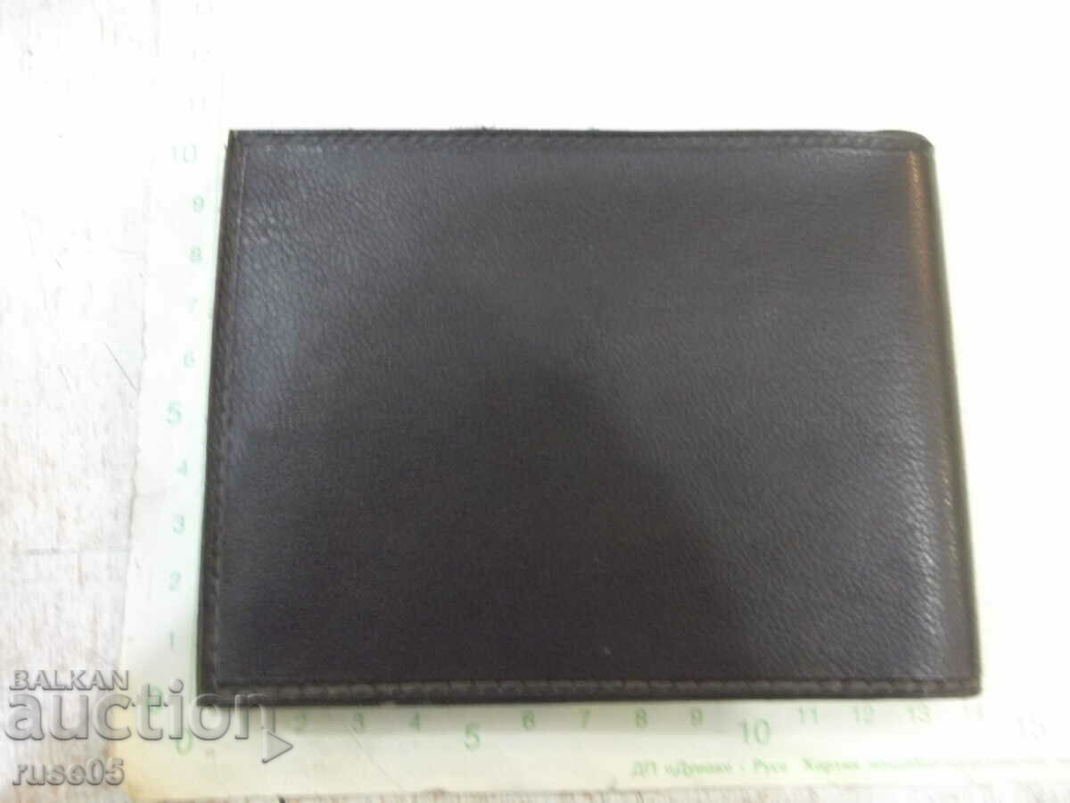 Faux leather wallet with price 3.00 BGN | € 1.53 Faux leather wallet with price 3.00 BGN | € 1.53