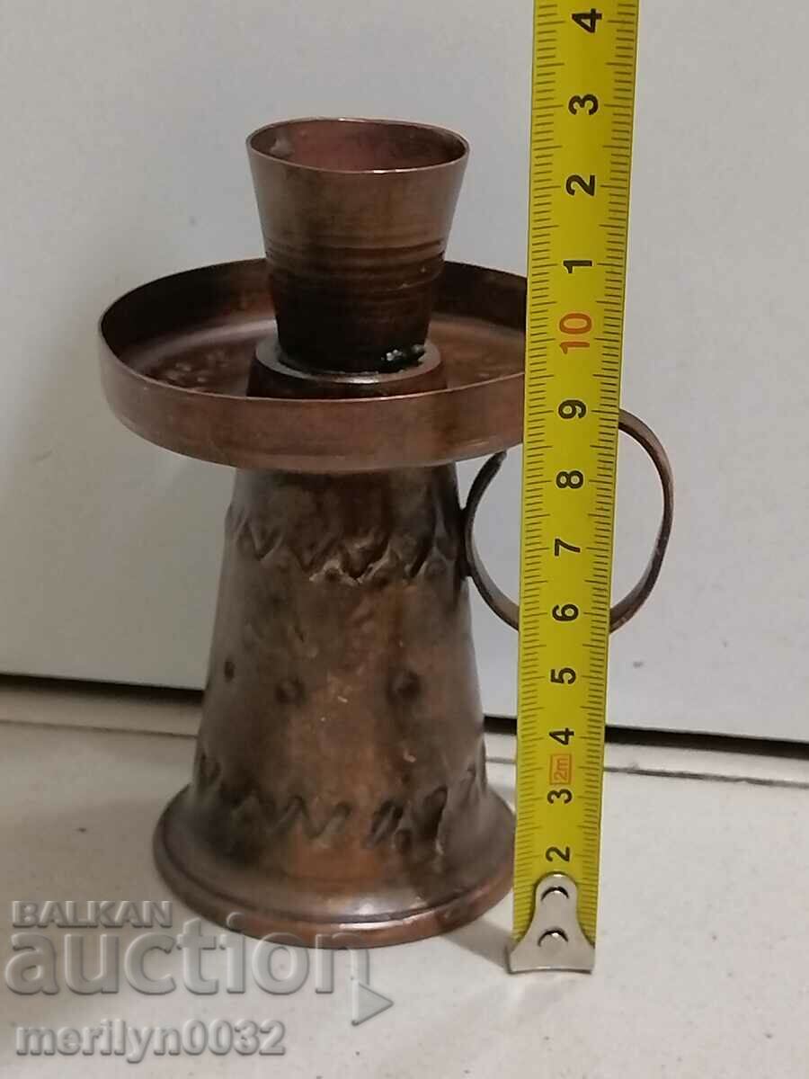 Auction  Old wrought copper candlestick from the social period, candle