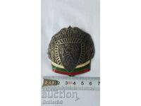 Poliția - pălărie cocardă, emblemă