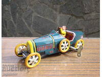 παλαιά λαμαρίνα μηχανικό παιχνίδι αυτοκίνητο με κλειδί