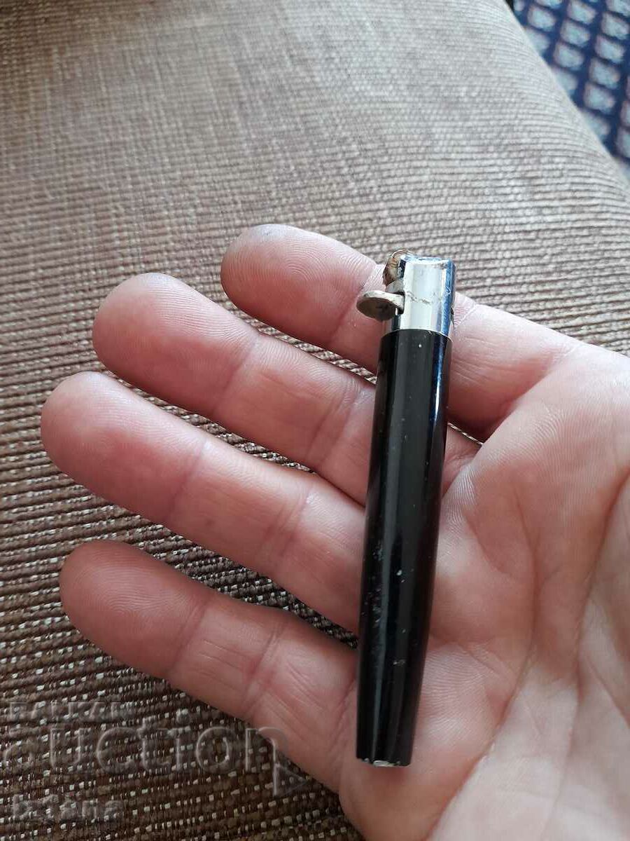 Auction An old lighter Auction An old lighter