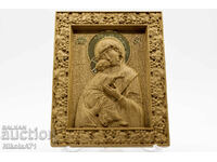 Relief icon of the Holy Mother of God with the Child from solid oak
