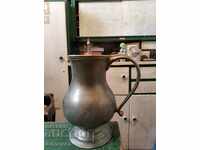 Old bronze jug