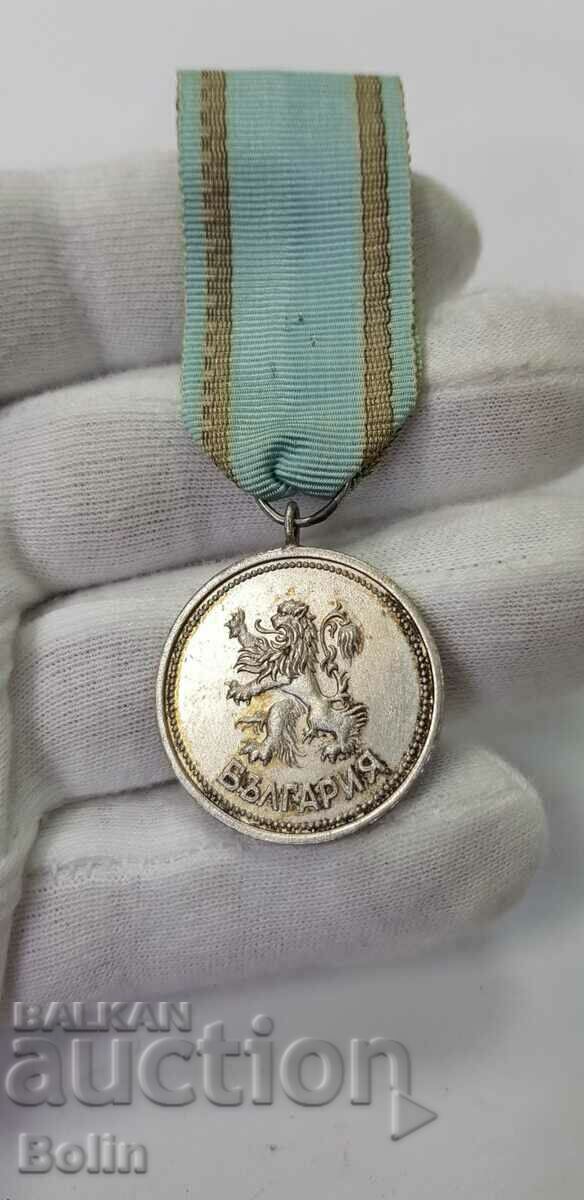 Rară medalie de merit placată cu argint Regency