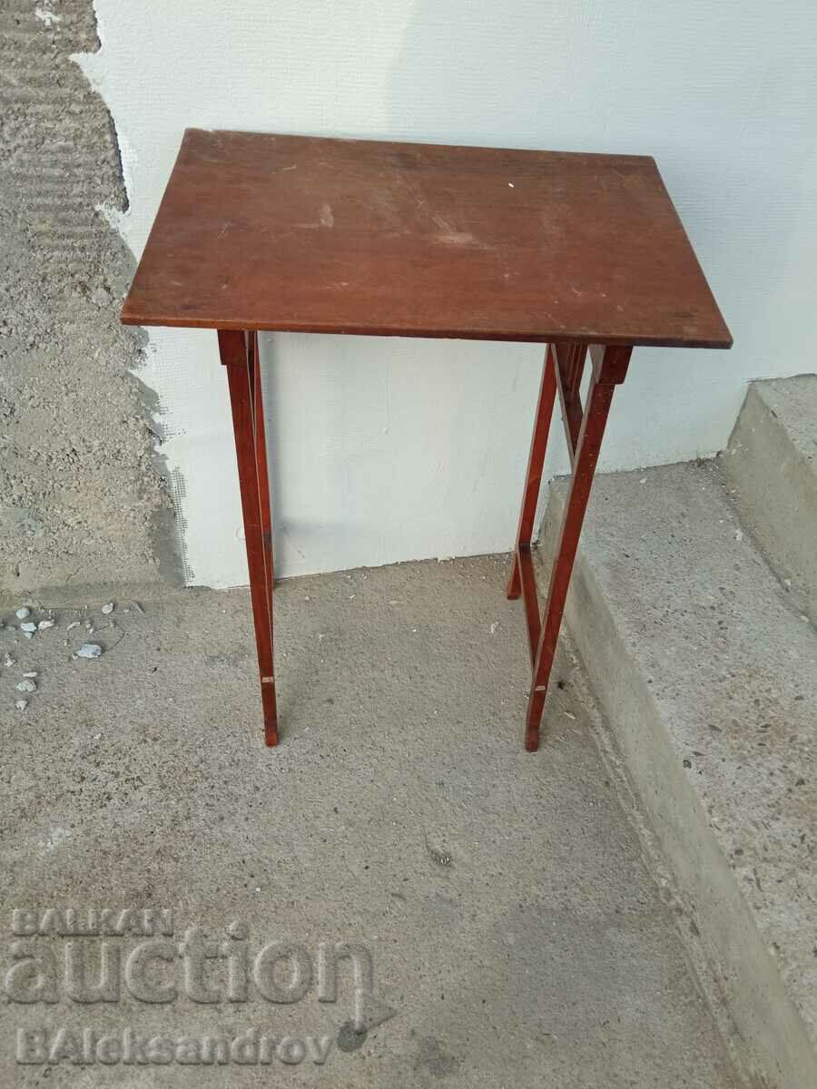 Old small wooden table