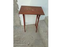 Old small wooden table