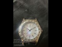 Guess branded ladies watch. It works, excellent.