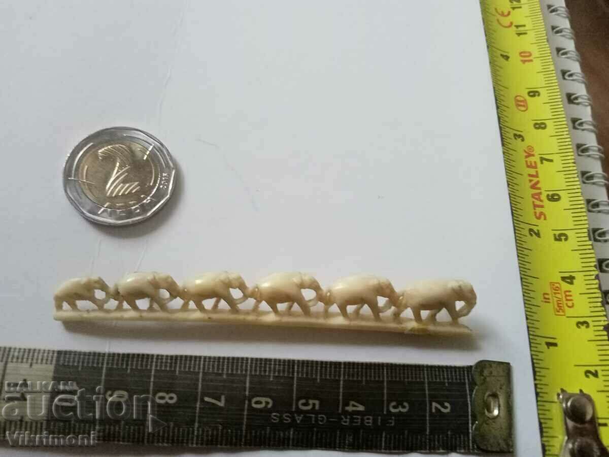 From my aunt's chest, an old ivory brooch with price 55.00 BGN | € 28.12