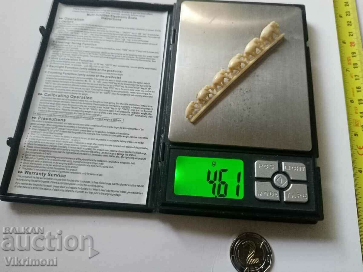 Auction  From my aunt's chest, an old ivory brooch