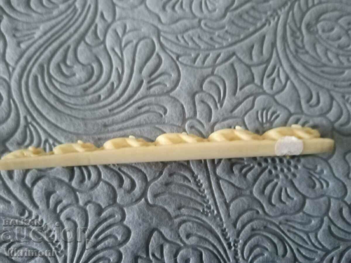 Delivery of From my aunt's chest, an old ivory brooch