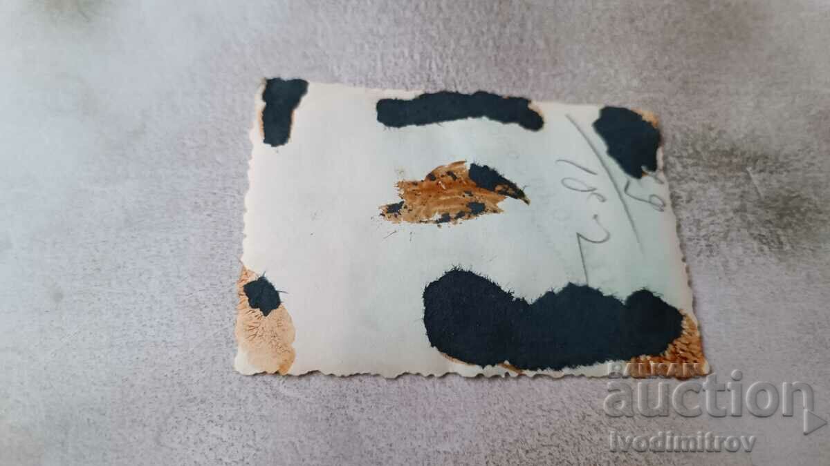 Photo Sofia Woman boy and girl in front of a grinder shop with price 2.45 BGN | € 1.25 Photo Sofia Woman boy and girl in front of a grinder shop with price 2.45 BGN | € 1.25