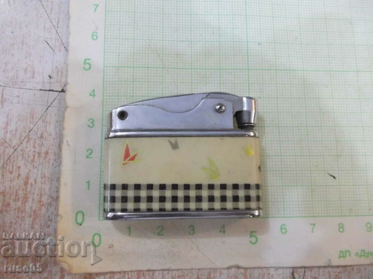 Auction Petrol lighter - 9 Auction Petrol lighter - 9