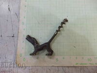 Corkscrew opener old bronze in the shape of a dog