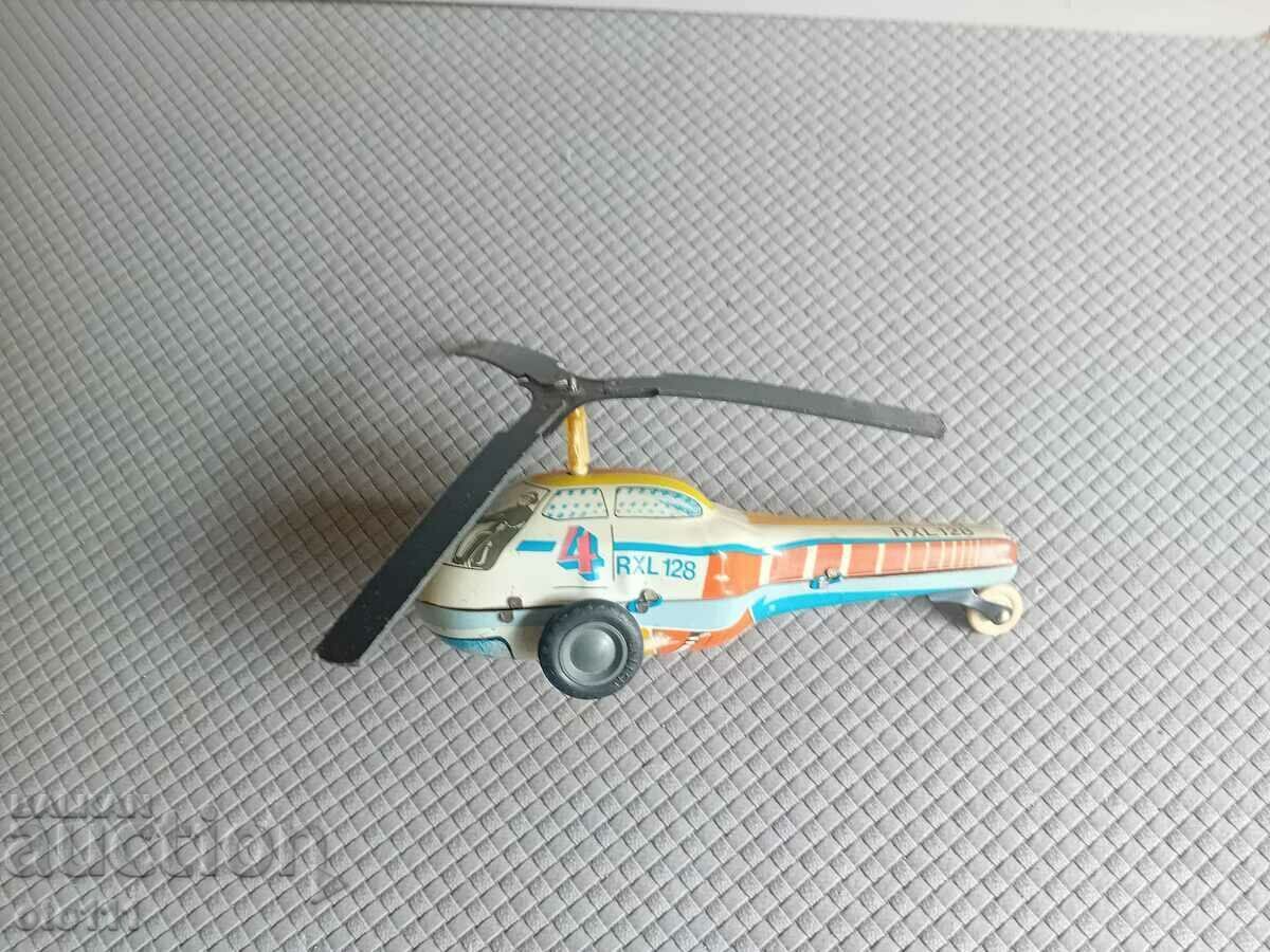 Delivery of OLD TIN TOY - HELICOPTER Delivery of OLD TIN TOY - HELICOPTER