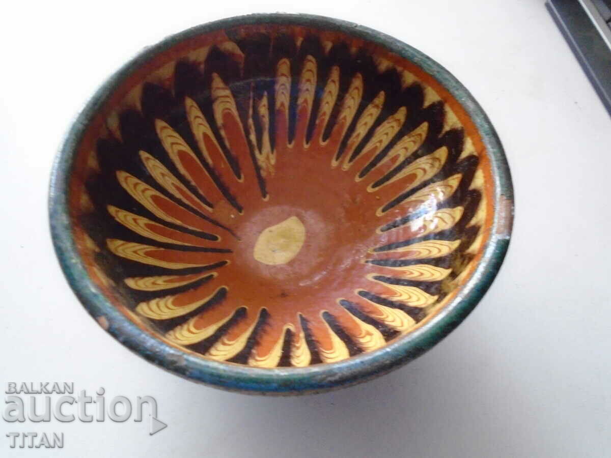 a rare deep ceramic bowl, glazed