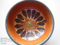 a rare deep ceramic bowl, glazed
