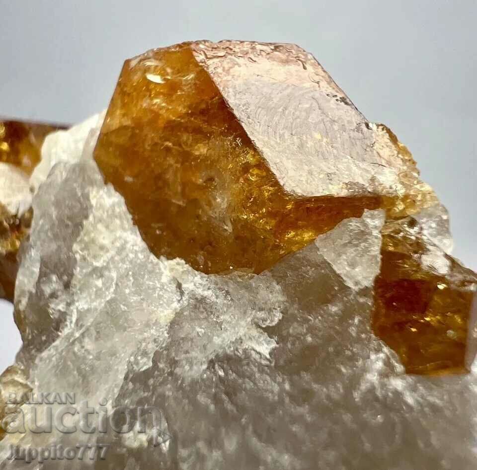 Auction 212 carat clinohumite on a unique matrix Auction 212 carat clinohumite on a unique matrix